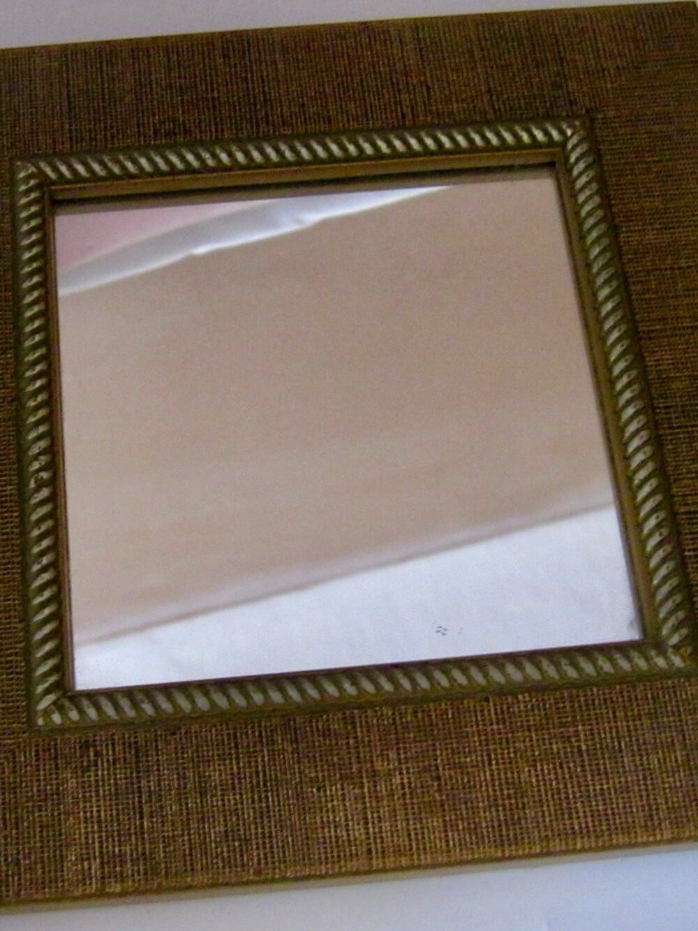 8" by 8" FRAMED MIRROR WITH BASKET-TYPE WEAVE AND CORD-LIKE SURROUND THE MIRROR
